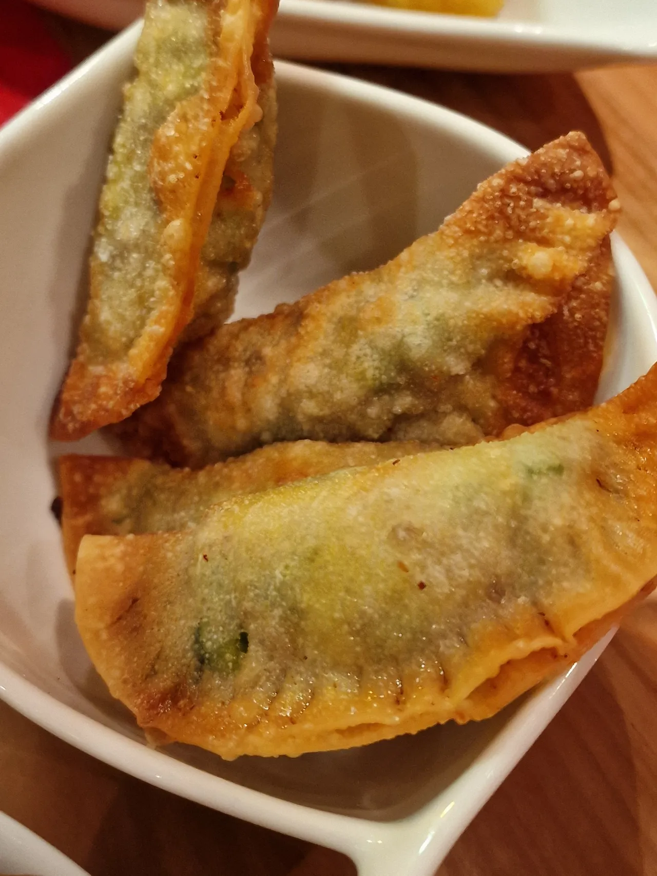 Crispy fried samosas served on a plate