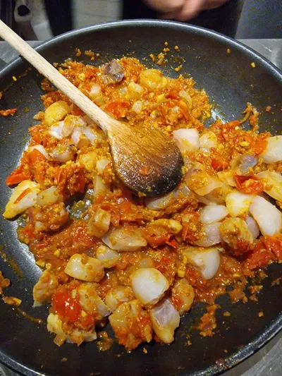 Monkfish stew with vegetables in a pan