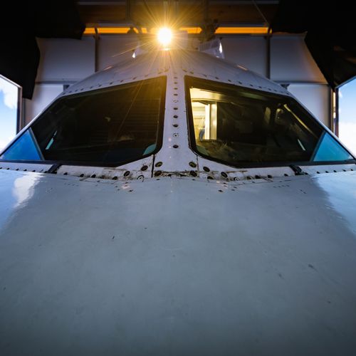 Exterior view of the original Airbus A320 nose section and cockpit windshield in the simulator hall