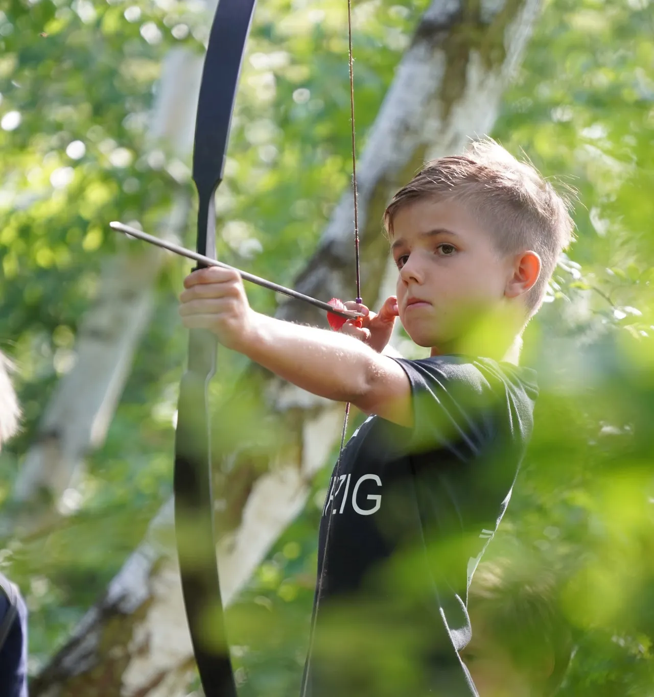 A boy doing archery
