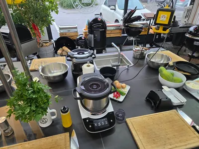 a cooking machine and ingredients on a table