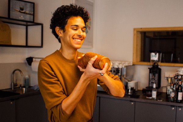 A person mixing a cocktail