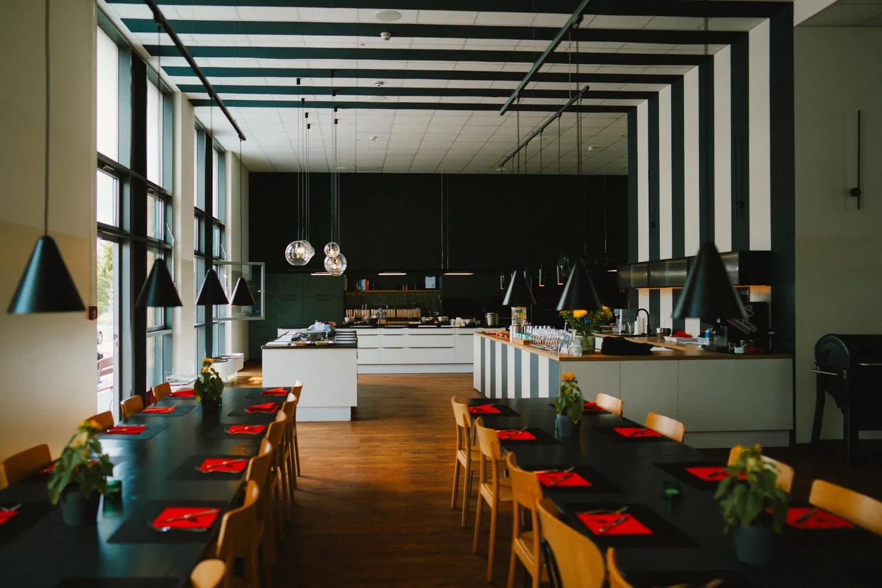 Long set tables in the cooking school