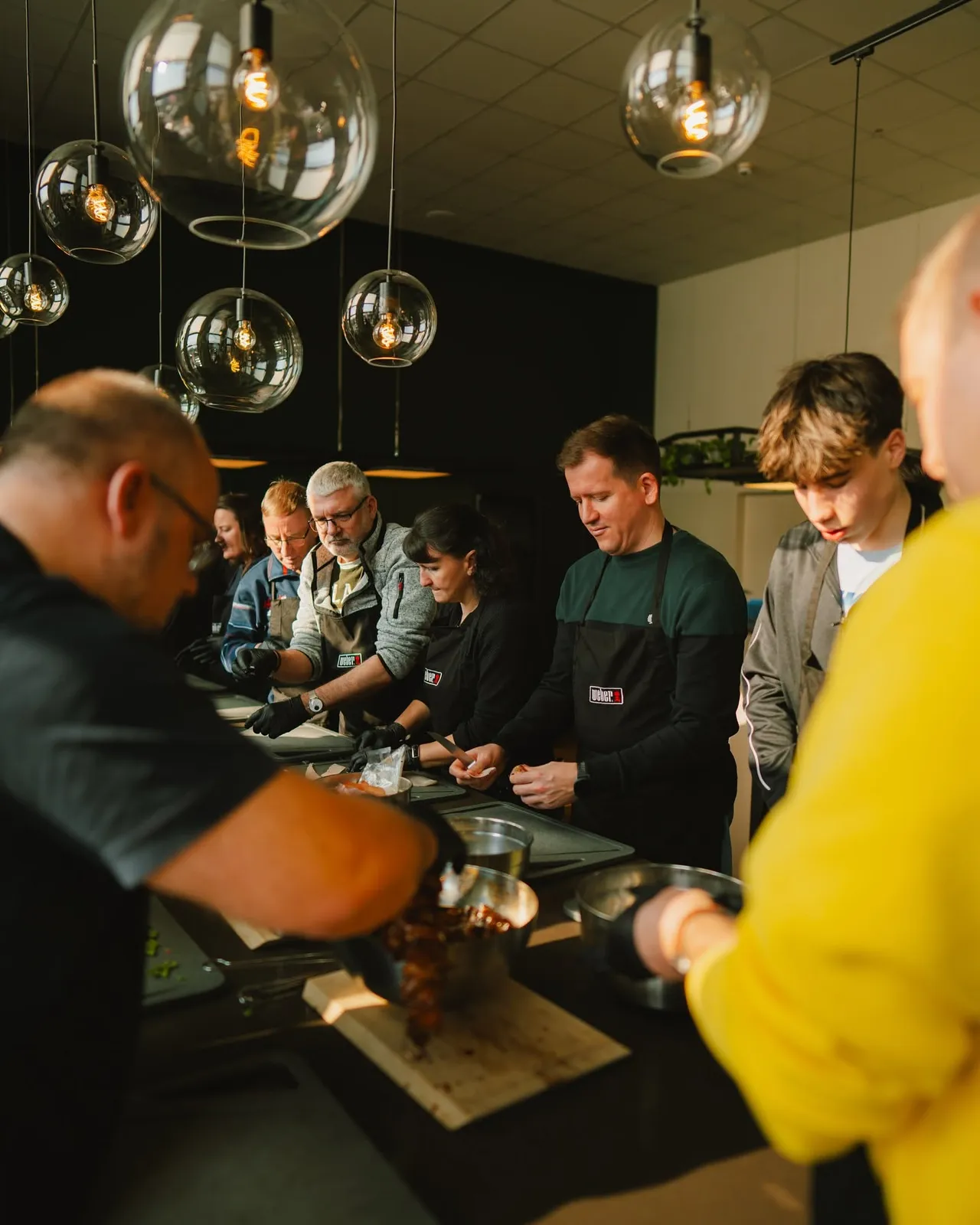 Chef instructing a group of participants