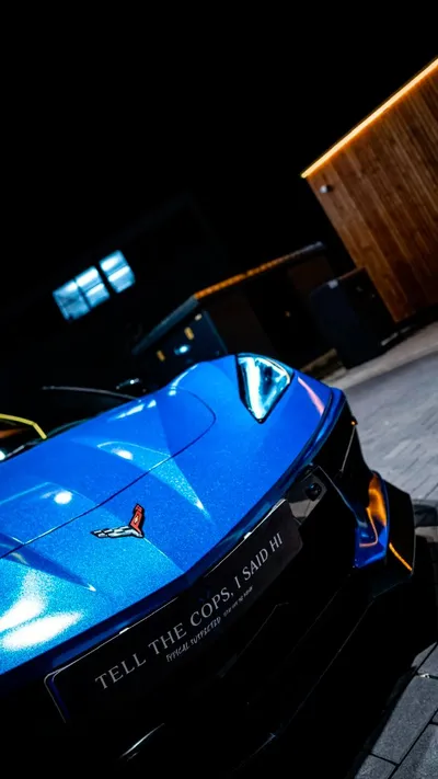 Close-up of the front end and Corvette badge of a Rapid Blue Corvette C8 Z51 Stage 2
