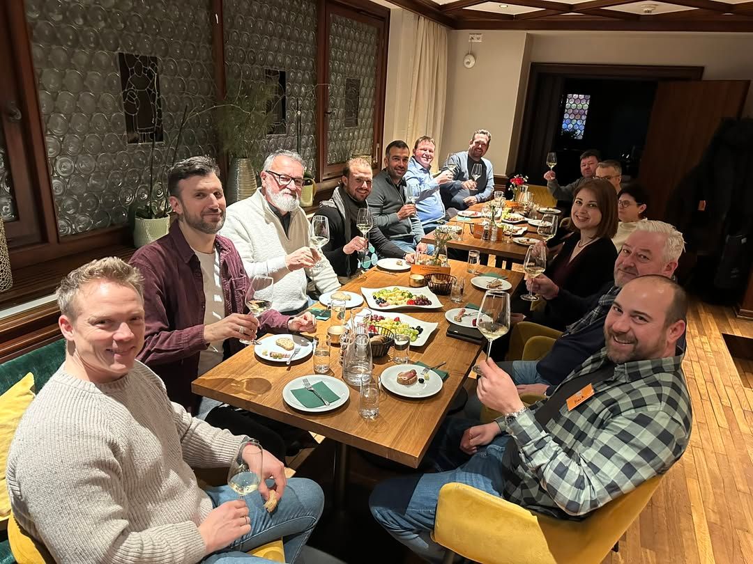 A group of people enjoying a meal together