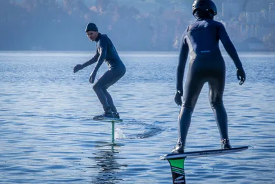 Two people efoiling on a lake