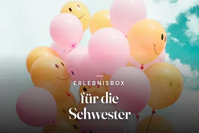 Experience gift box for your sister – pink and yellow smiley-face balloons against a blue sky