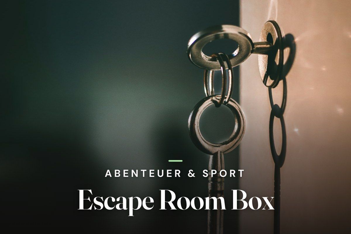 Escape room gift box: metal keys on a ring hanging from a door lock in a dim room