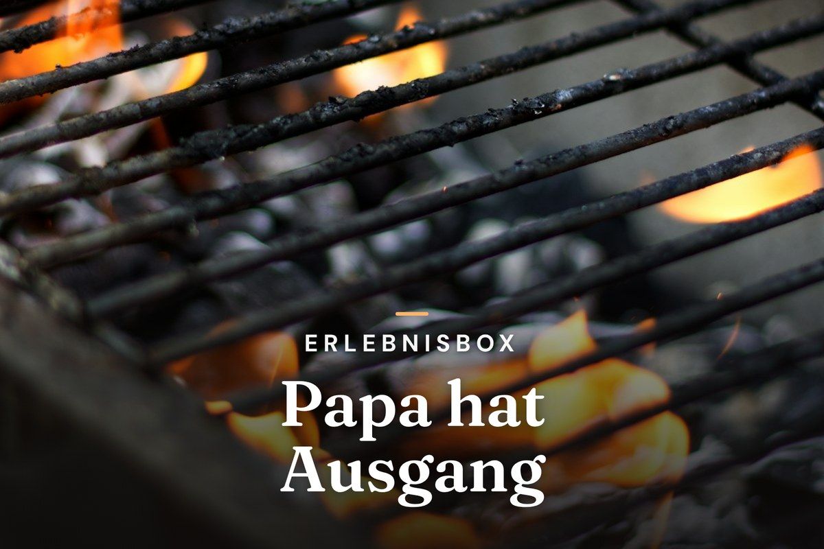 Close-up of a charcoal barbecue grill with glowing flames