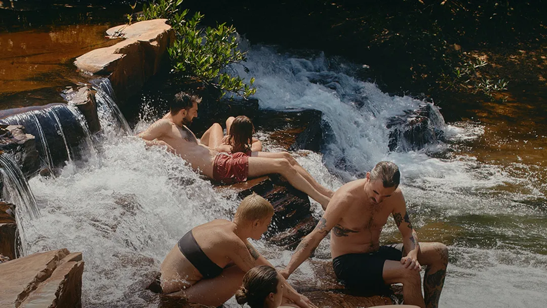 People enjoying time at the river