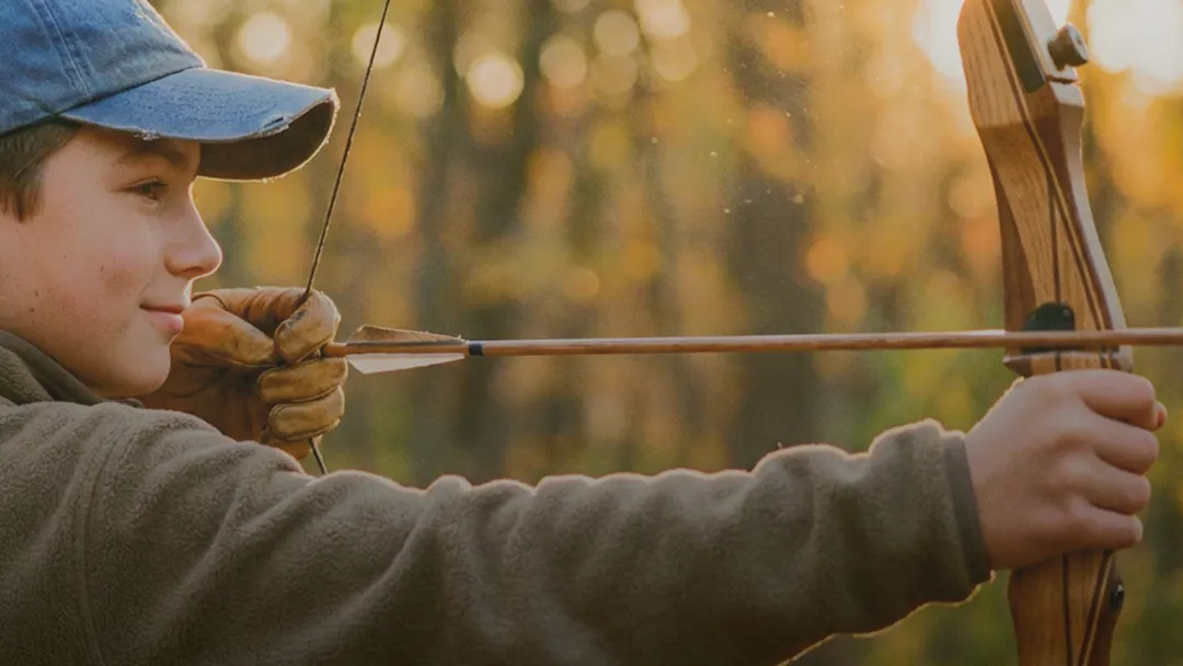 A person during an archery experience