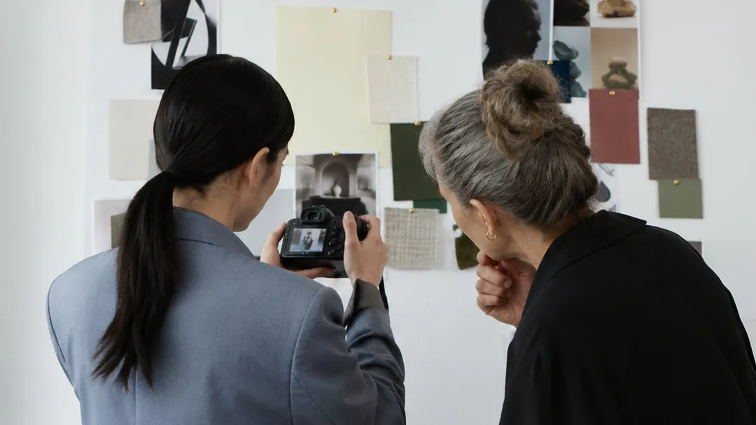 Two women learning about photography