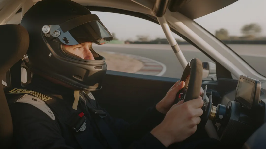A man in a racing car
