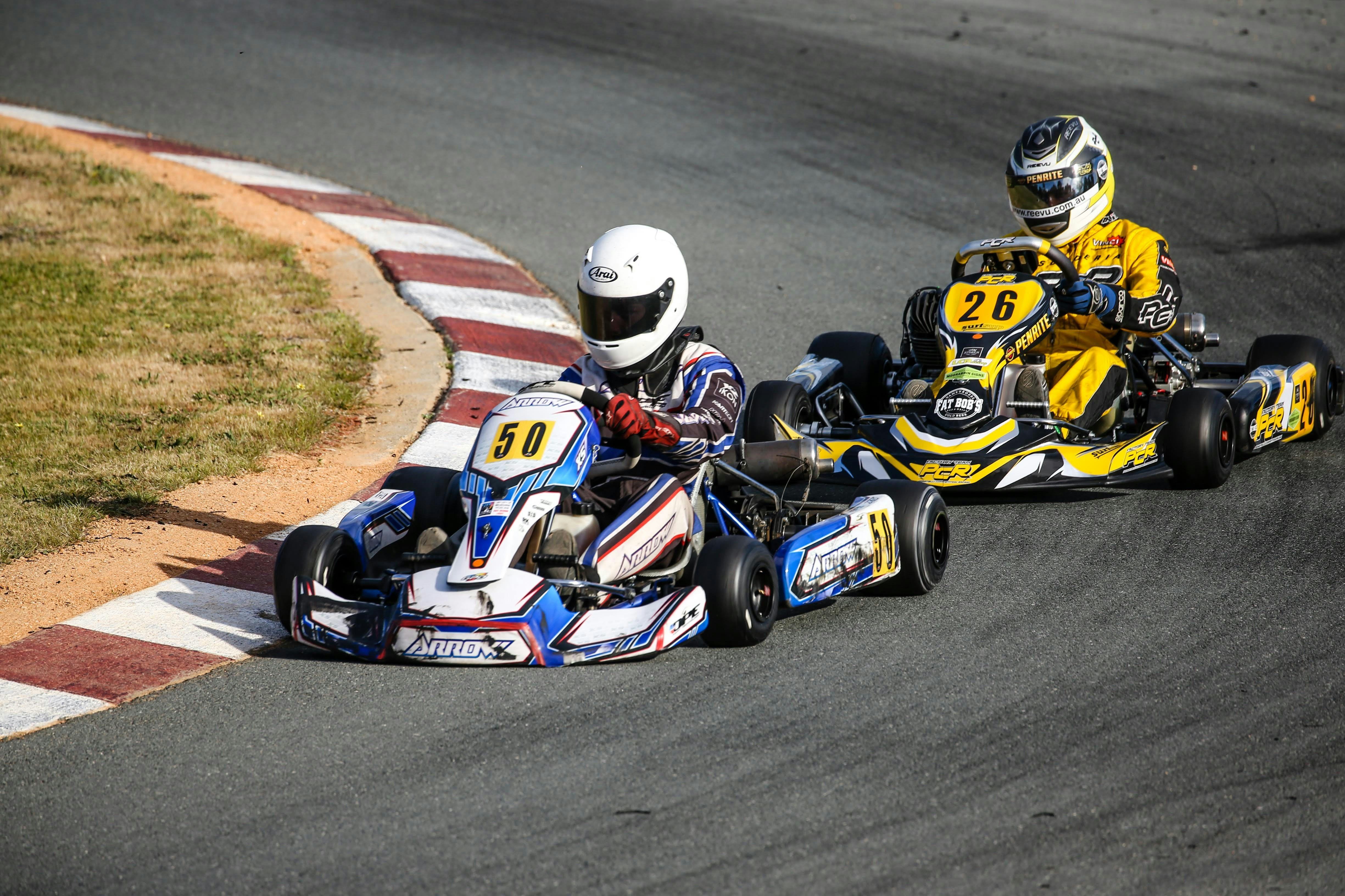 Two people competing in a GoKart