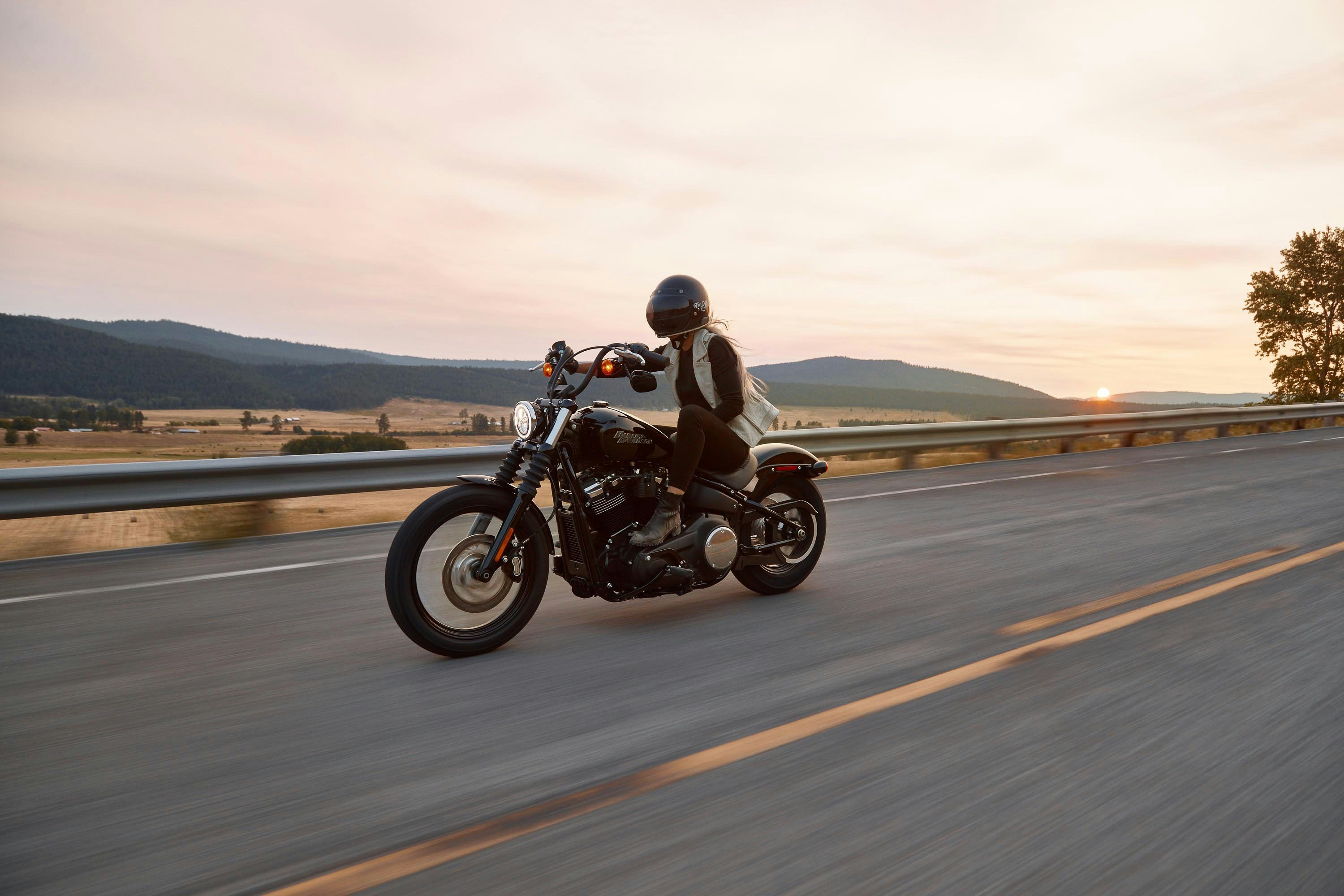 Women driving a Harley Davidson