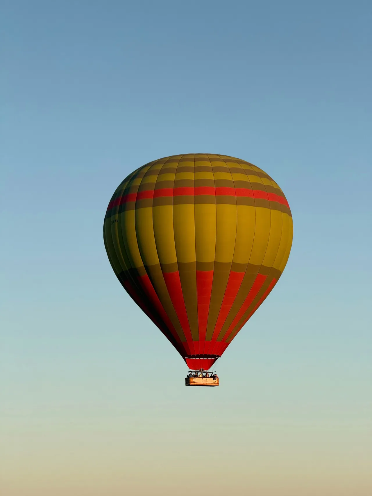 Colouful hot air balloon at sunrise