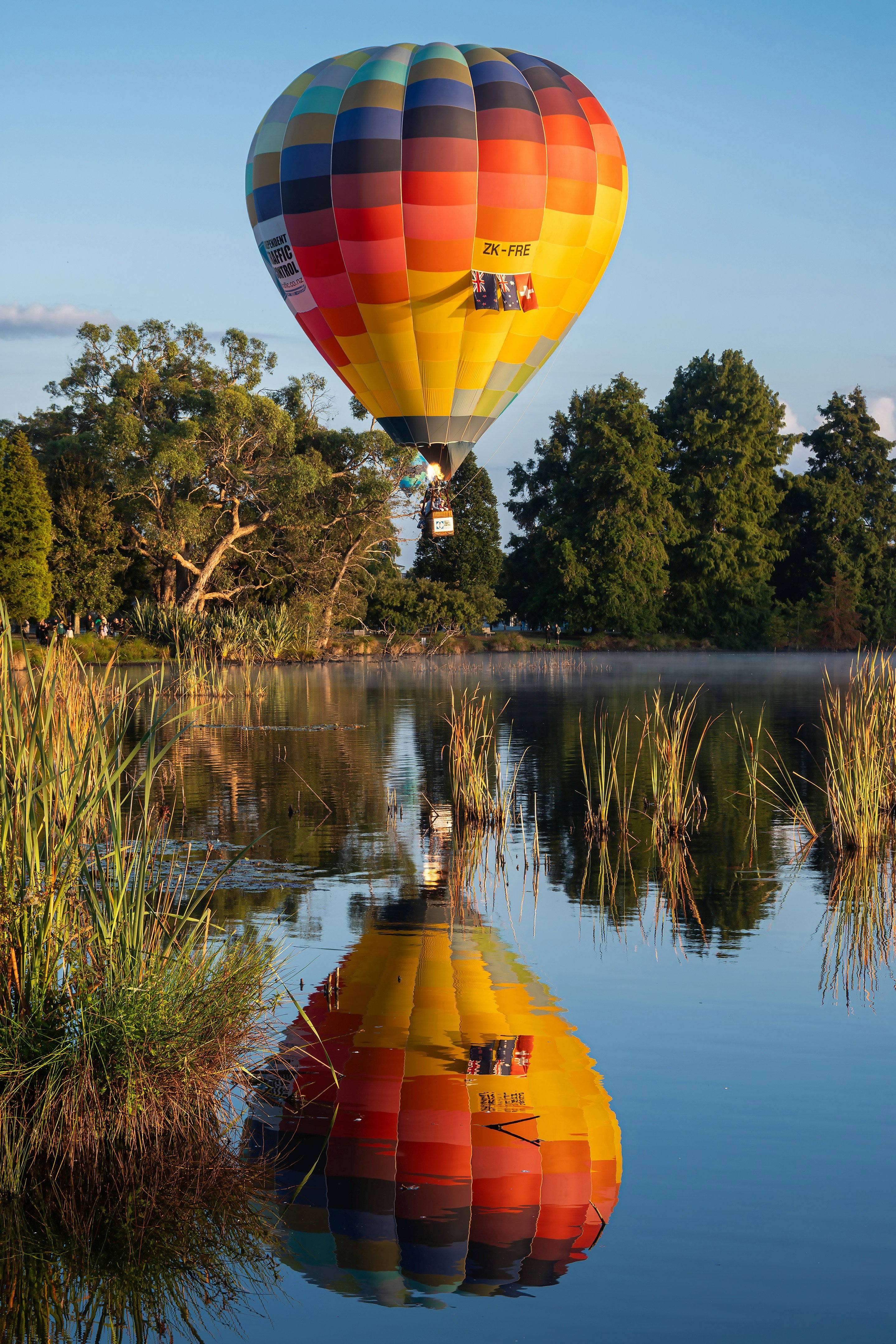 Hot air balloon over a lake