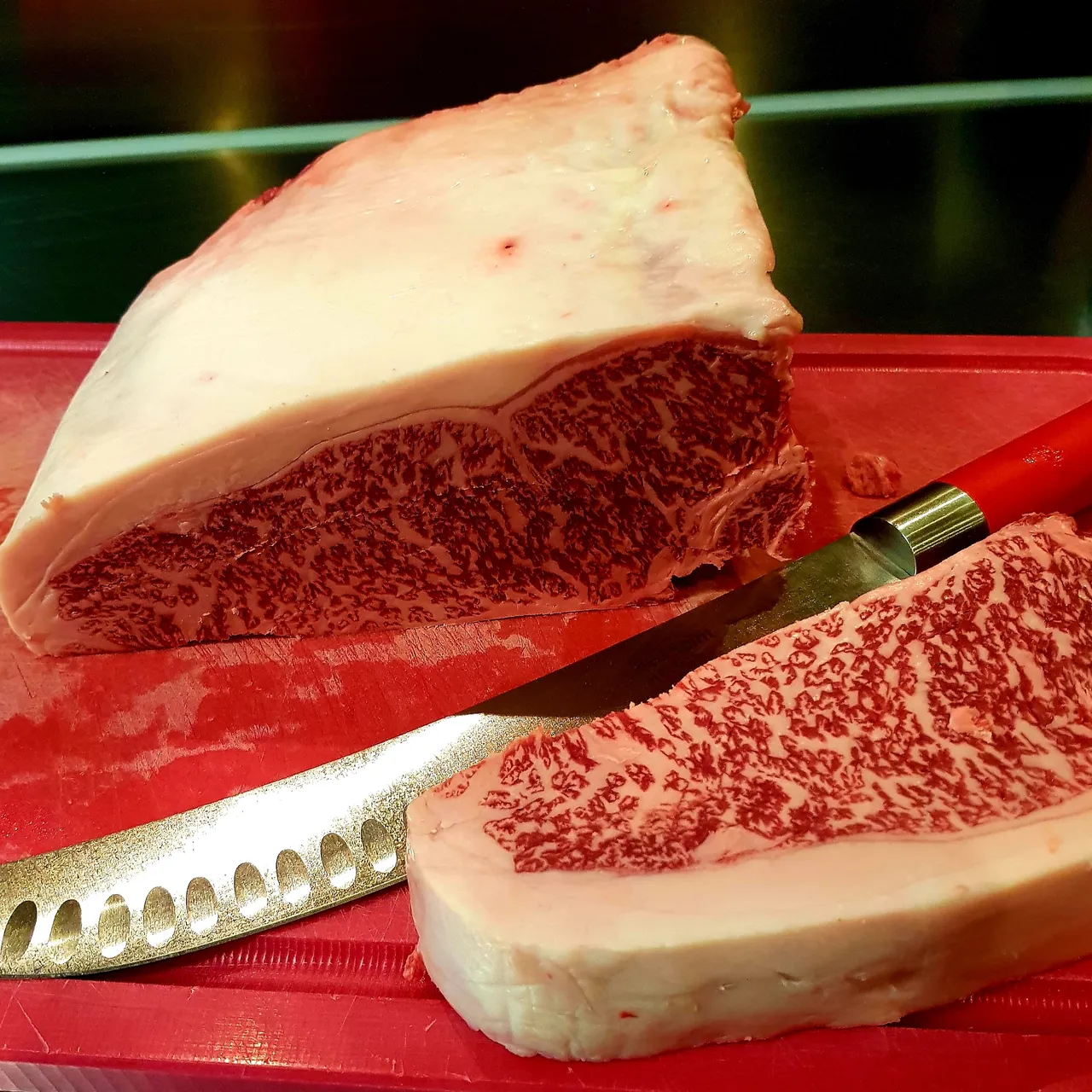 Premium roast beef steak on a cutting board