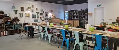 View of a table with colourful chairs