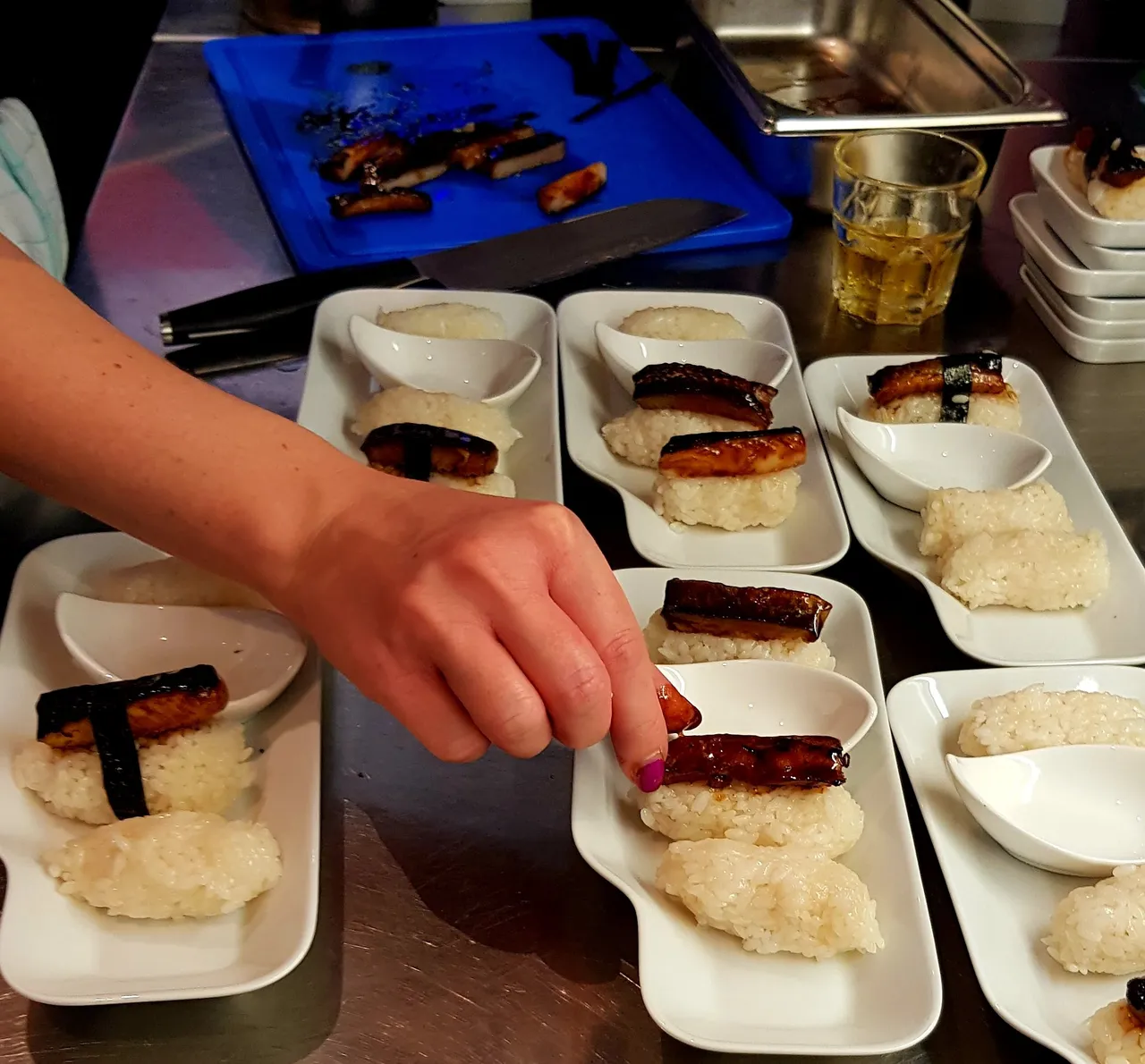 Preparing sushi rolls during a cooking class