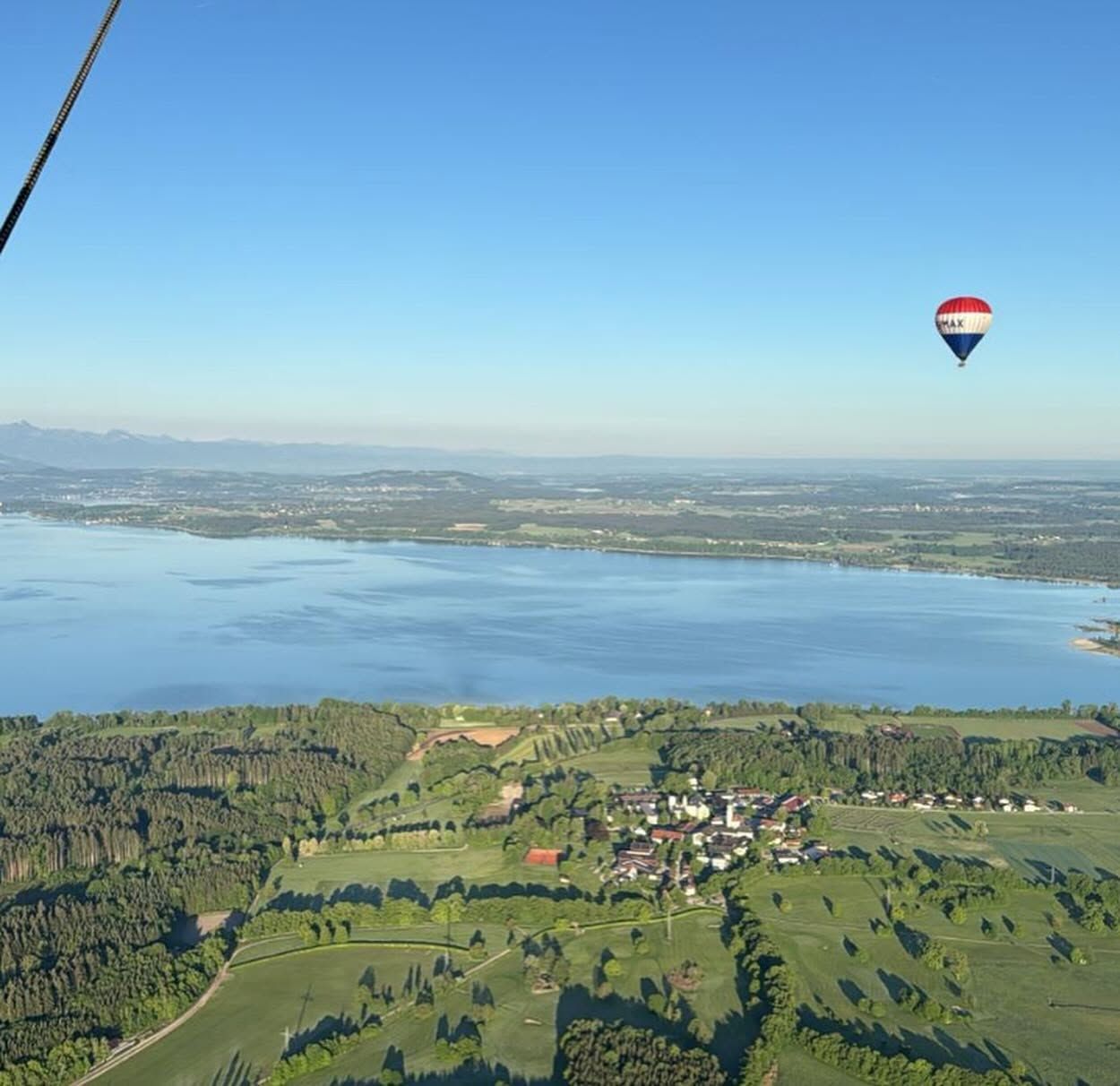 View of a big lake from a hot air balloon