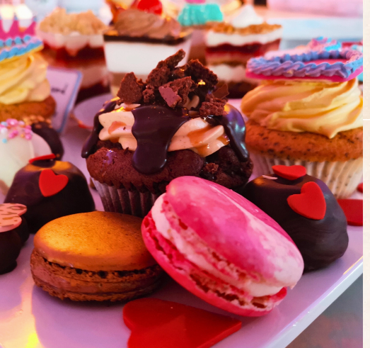 Macarons and cupcakes on a plate