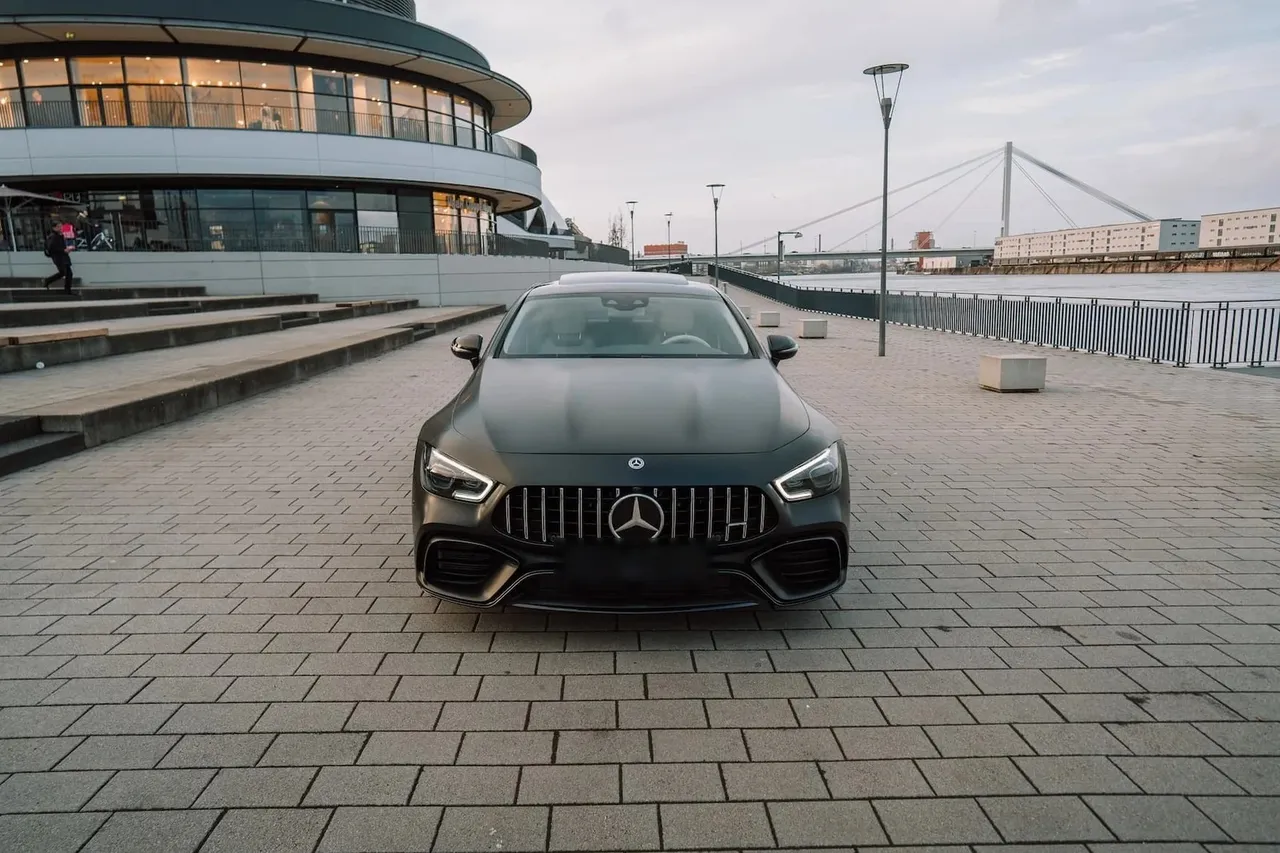 Front view of a matte black Mercedes-AMG GT 63