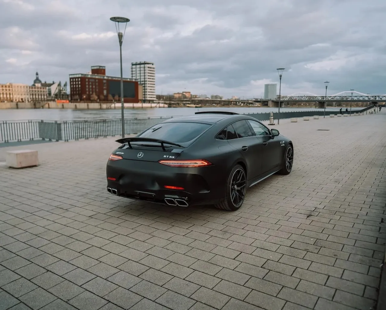 Rear three-quarter view of the Mercedes-AMG GT 63 with rear spoiler