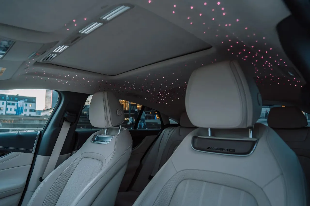 Grey leather seats of the Mercedes-AMG GT 63 under a starry headliner