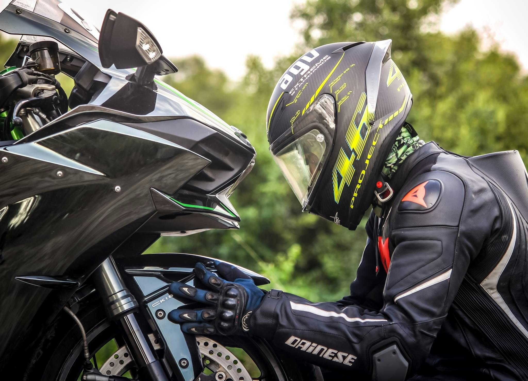 Person checking a motorbike
