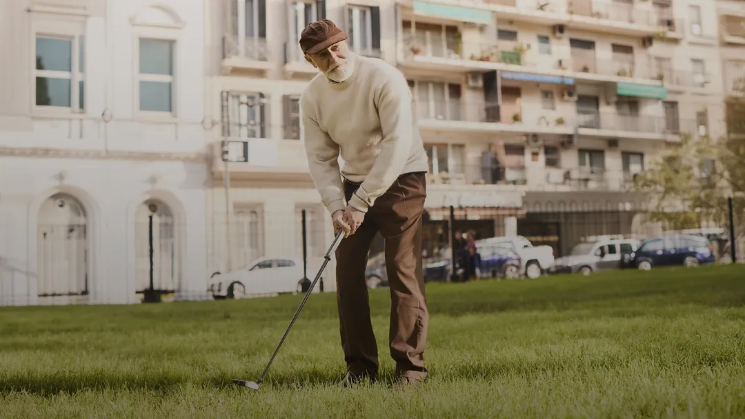 A man playing golf