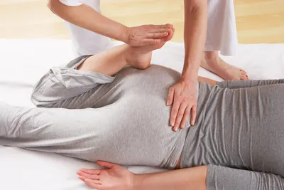 Woman having Shiatsu massage
