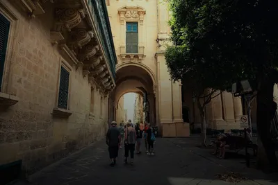 City tours: historic old town street with an archway