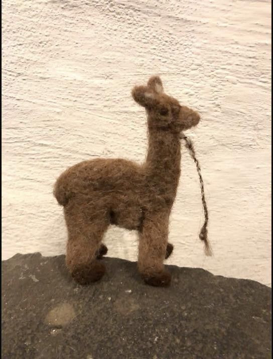 Hand-felted alpaca figure made from natural wool